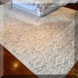 D19. Wool patterned gray rug. 9' x 13' - $350 